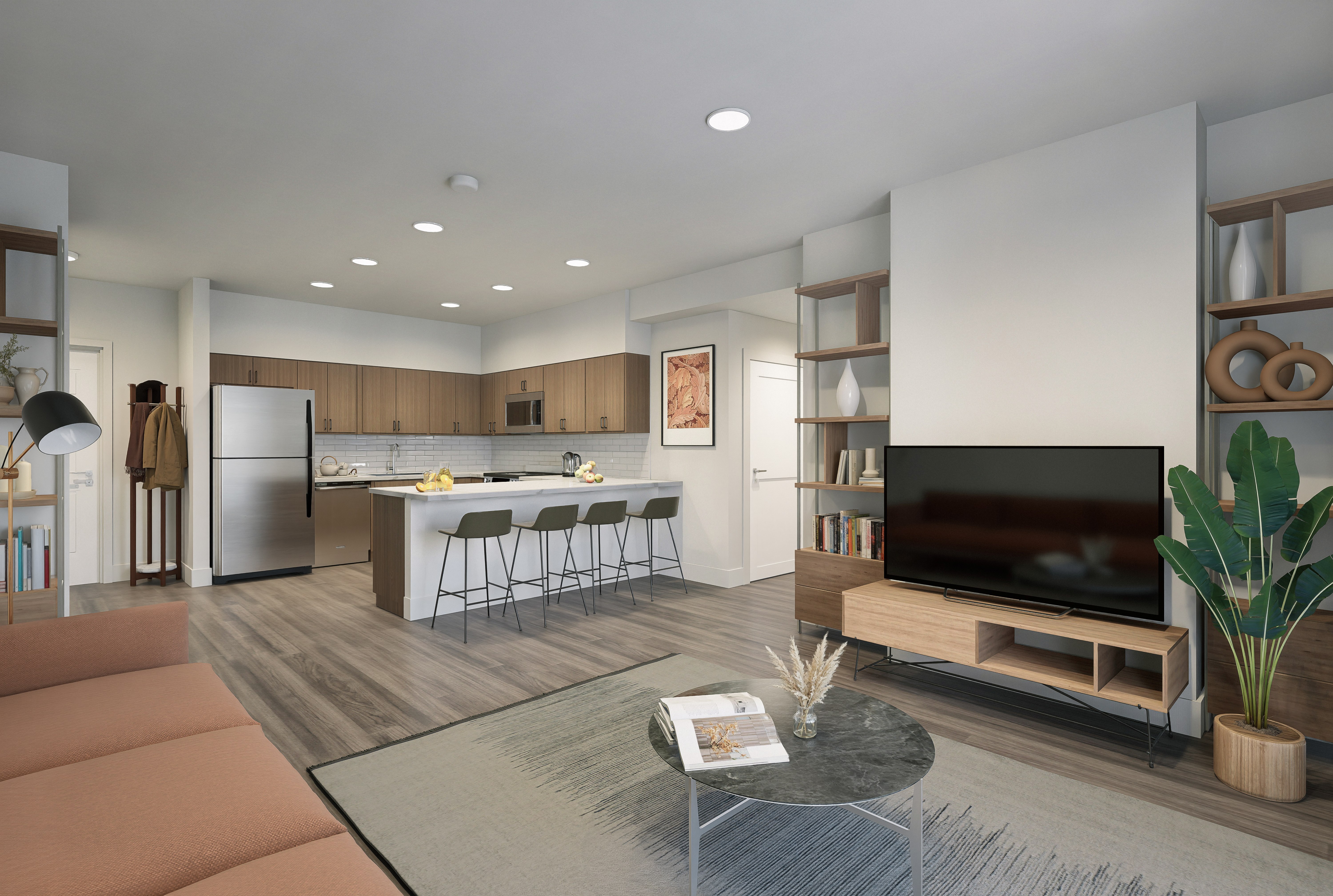 A modern living room with a kitchen in the background.